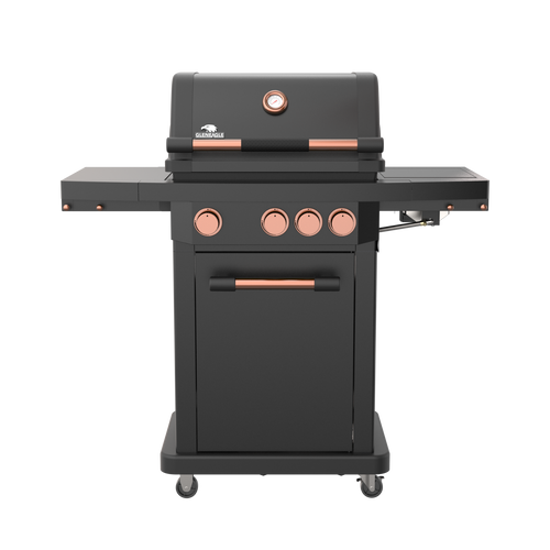 A black gas grill with copper accents and a side table, shown on a plain white background.